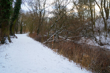 River Ilm and the park in Weimar in winter season, snow covered