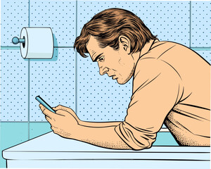 Man distracted by phone on toilet with toilet paper roll nearby