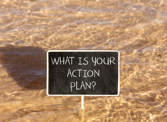 Naklejka premium What is your action plan symbol. Concept words What is your action plan on beautiful blackboard. Beautiful Red sea water background. Business what is your action plan concept. Copy space.