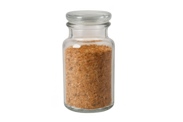 Glass jar with brown seasoning powder on transparent background