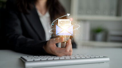 Concept of digital communication and correspondence. Receiving a new message or notification in an email inbox, representing online information exchange and alerts. Fermion