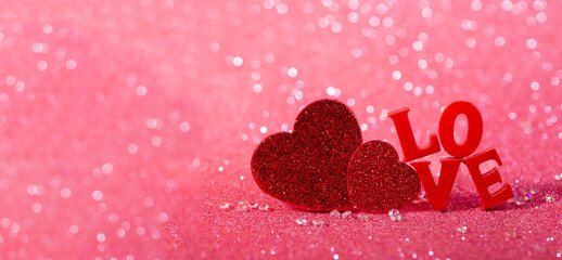 Red Love Hearts and Love Letter Decoration on Glitter Background. The Valentines Day concept perfect for holiday designs, greeting cards, and advertising.