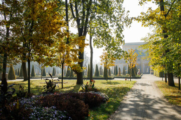 Sunny golden autumn in Wilanow park in Warsaw, Poland. Royal polish residence park in autumn, museum under an open sky without people