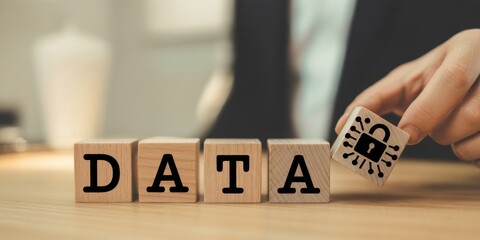 Data protection and digital security concept. Wooden blocks with text DATA and padlock icon. Data protection, privacy, cybersecurity, secure networks, encryption and safeguarding information.