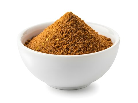A mound of garam masala spice blend in a white ceramic bowl, warm brown color with fine texture, isolated on a white background.