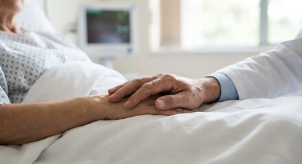 Close up of doctor's hand gently holding an elderly patient's hand in a hospital bed for compassionate medical support concept during recovery