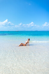 Back View Woman In White Bikini On Tropical Thailand Beach, Turquoise Sea