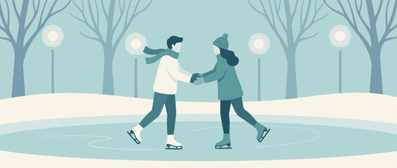 Romantic couple in warm winter clothes ice skates hand in hand on a frozen rink in a snowy park with glowing streetlights during a cold evening