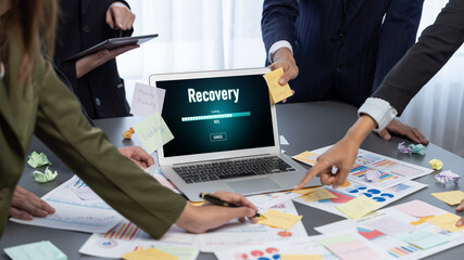 Analyst team use sticky note for creative and analytic brainstorm for business idea with BI data dashboard on laptop screen. Analysis financial data visualization tech for marketing strategy. Prodigy