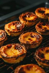 Portuguese Custard Egg Tarts : A close-up, top-down view of pastel de nata
