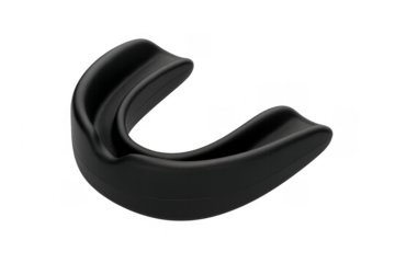 Black mouthguard protecting teeth during contact sports