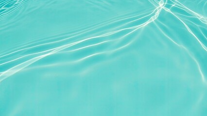 Calming turquoise water surface with gentle ripples and sunlight reflections