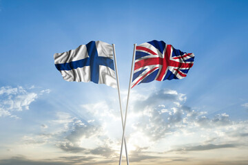 Waving National flag of Finland and flag of United Kingdom