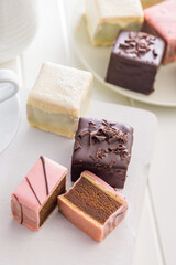 Sweet dessert cake. Mini pie on white table.