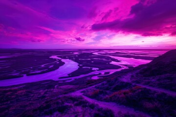 Fototapeta premium A purple sky with a river running through it