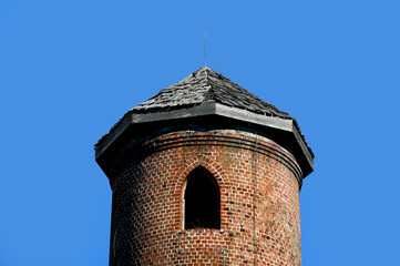 Brick Tower With Arched Window