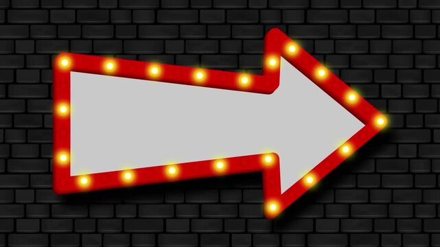 animated arrow shaped signboard on black bricks wall