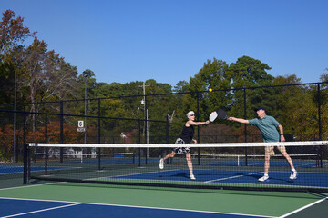 Collision on Pickle Ball Court