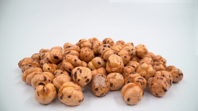 Close up of Turkish roasted chickpeas on isolated white background