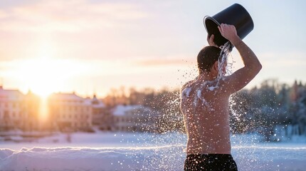 Man pouring cold water over himself outdoors during winter, surrounded by snow and a beautiful sunset, showcasing the invigorating experience of cold water hardening