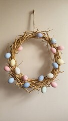 A decorative wreath made of twigs adorned with pastel-colored eggs. The wreath symbolizes Easter and spring celebrations, adding a festive touch to home decor.