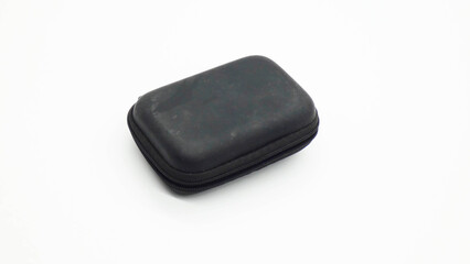 Compact black case with zipper for storing small items on a plain background