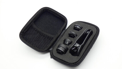 Lens kit in a small case for smartphones on a white background with a simple design