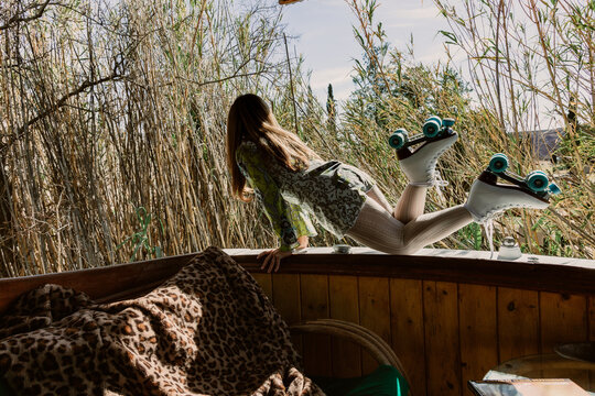 Lady posing in roller skates