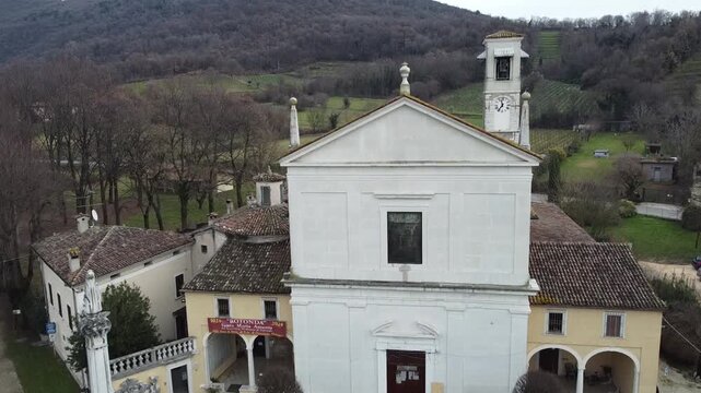 Aerial view of the historic Santa Maria Assunta Church, known as La Rotonda, in Rezzato, Italy. Ancient Romanesque architecture in the Valverde valley, Brescia province.