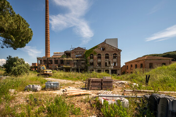 Abandoned sugar factory interior in Italy. Industrial urbex photography of derelict refinery ruins...