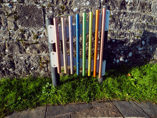 Obraz premium Colorful musical tubes in a playground for children. Outdoor activity for fun and education.