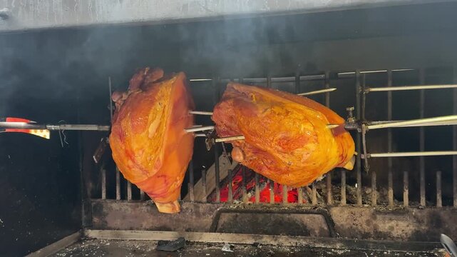 smoking pork knuckle in the Czech Republic Traditional cooked pork leg on a Prague dish Prague.