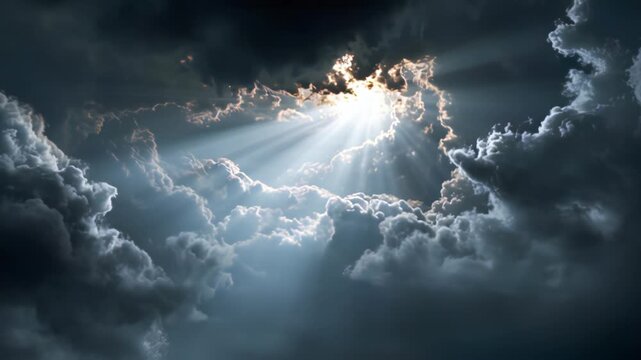 Sunlight breaking through dark storm clouds creating dramatic rays of light.