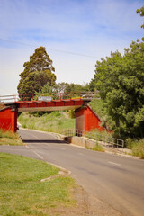 old railway bridge over country road in regional tourism town of Daylesford