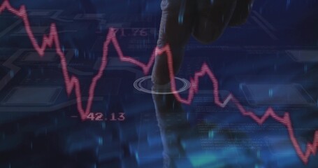 Tapping man's right index finger, forearm in dark sleeve at high-tech display, with red graph 42