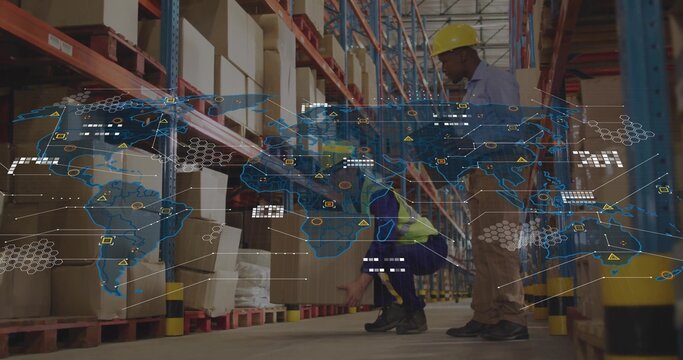 Inspecting workers crouching checking pallet in warehouse, wearing safety gear, AR map, copy space - Powered by Adobe