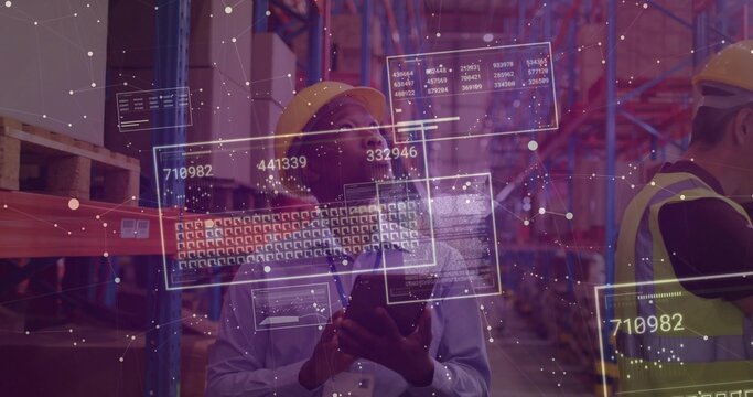 Inspecting man holding tablet checking stock in warehouse wearing yellow hardhat or vest, AR overlay - Powered by Adobe