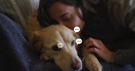 Cuddling woman in gray sweater pressing cheek to golden dog on dark couch, white speech bubbles