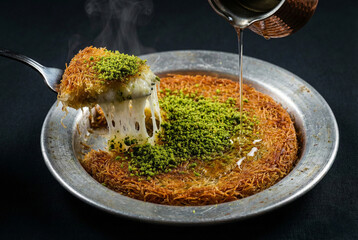 Sizzling Hearth Turkish Kunefe with Melting Cheese Pistachios and Hot Syrup