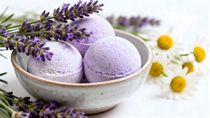 Purple color bath bombs with fresh lavender and chamomile flowers; herbal bath bombs in small bowl 