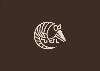 A geometric simple armadillo logo with clean segmented shapes, representing protection, durability, adaptability, balance, and strategic defense