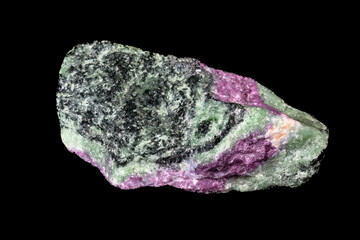Fototapeta premium Ruby zoisite sample from Tanzania. Red minerals are ruby crystals. Green ones are green zoisite. Black background. 
