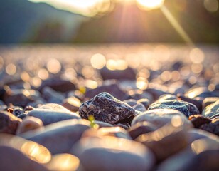 Macro photography of smooth river stones and pebbles on a beach at sunset with soft bokeh
