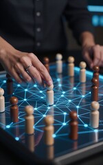 Hand places wooden figure on glowing digital network, symbolizing human connection and strategy.