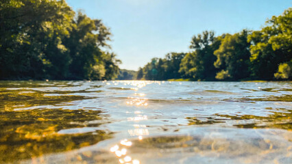Tranquil river reflection under bright sunlight  