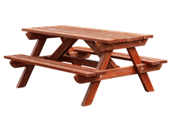 Rustic wooden picnic table, stained reddish-brown, isolated against black background