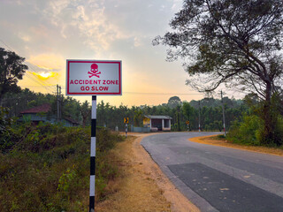Traffic rules and signs board on road for accident prone zone for the driver as warning.
