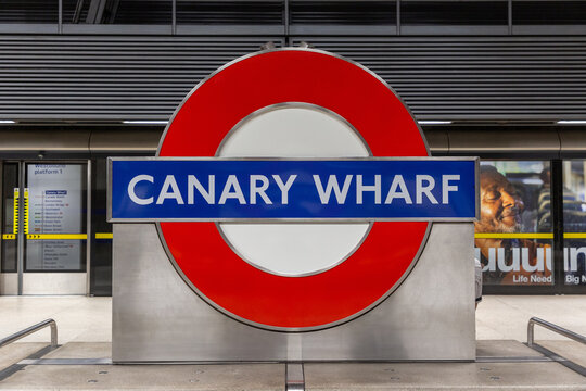 Canary Wharf London Underground station roundel sign in London, England, UK
