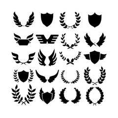 Fototapeta premium Collection of vector heraldic elements including laurel wreaths shields wings and ribbons perfect for creating logos or designs . elegant laurel wreaths, shields, wings, and ribbon vector set