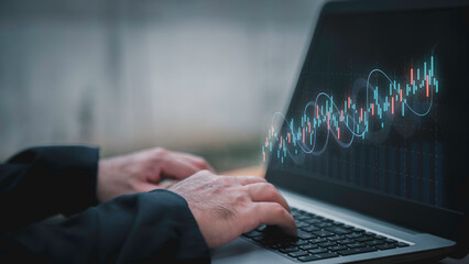 Businessman analyzing stock market data with digital candlestick chart, investment and opportunity concept, trading strategy, financial growth, business and enterprise analysis.